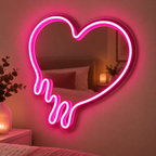 Rosa LED neonhjärta på vägg