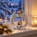 Änglafigur i fönster